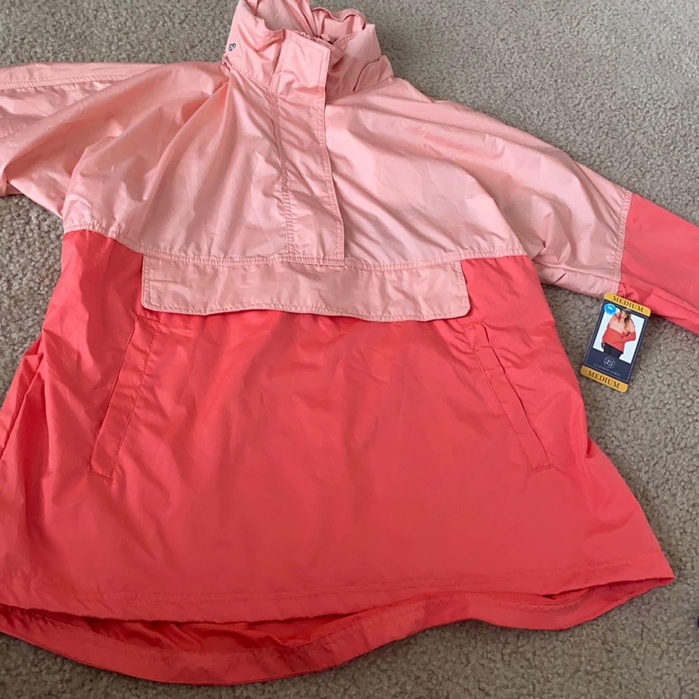Brand new rain coat